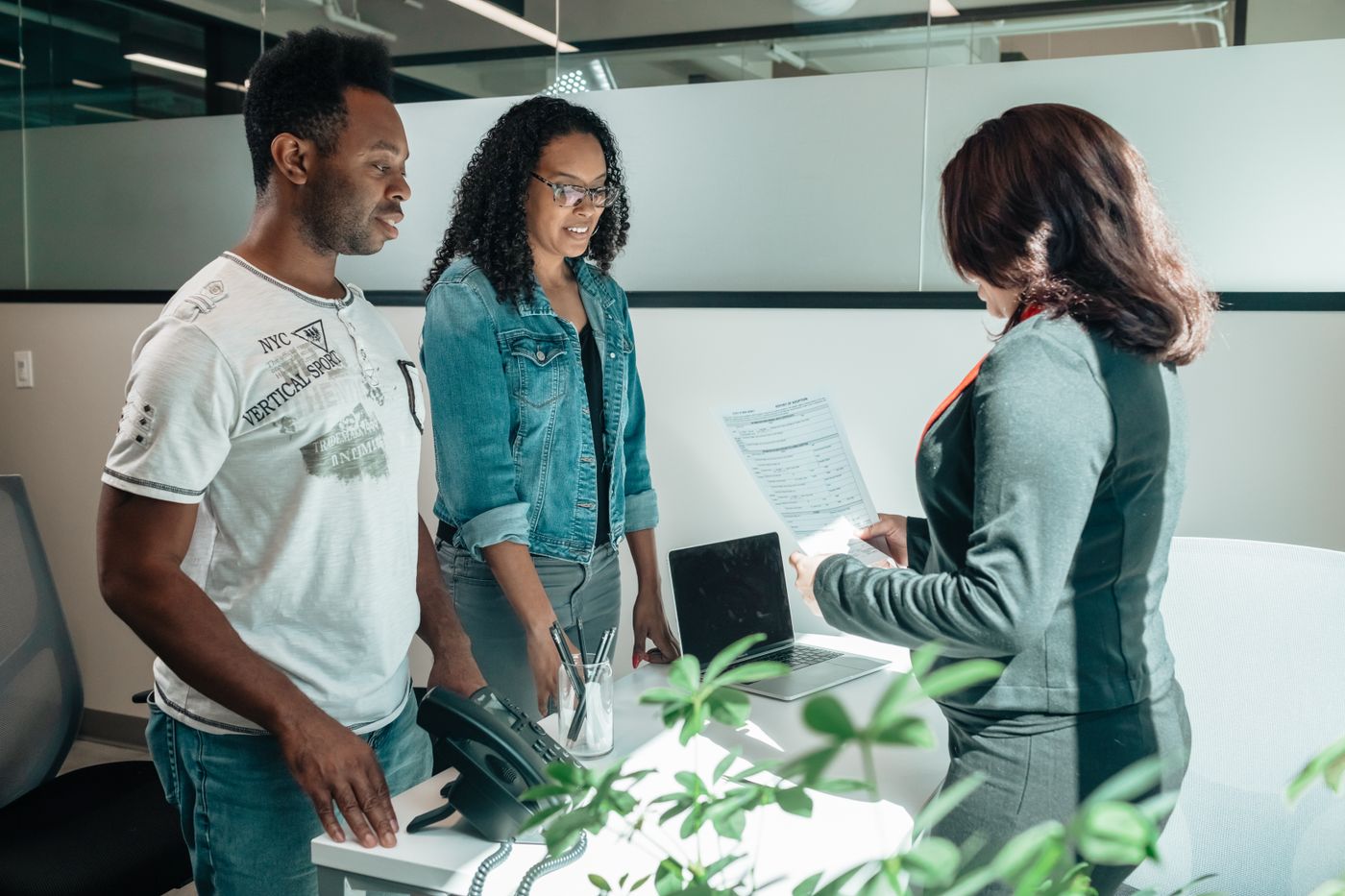 A family meeting with a professional to review documents